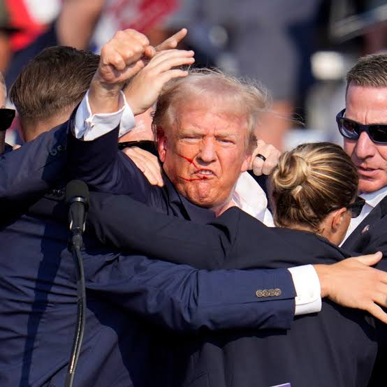 Moment Donald Trump escapes alleged assassination attempt Moment Donald Trump escapes alleged assassination attempt
